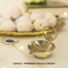 Load image into Gallery viewer, Gold toned Alangara Peacock Diya