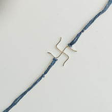 Load image into Gallery viewer, Silver Swastik Rakhi with blue thread