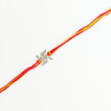 Load image into Gallery viewer, Silver Plated Swastik Rakhi with red and yellow threads