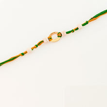 Load image into Gallery viewer, Gold plated pendant Rakhi with tulsi beads