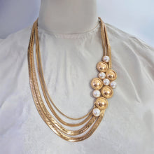 Load image into Gallery viewer, Dramatic surya and pearl gold necklace
