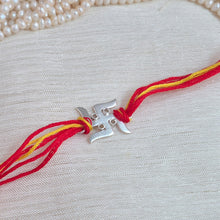 Load image into Gallery viewer, Silver Plated Swastik Rakhi with red and yellow threads
