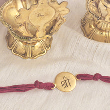 Load image into Gallery viewer, Gold Plated Shri Medal Rakhi with maroon thread