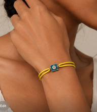 Load image into Gallery viewer, Silver Motif Neon Cord Rakhi bracelet