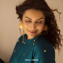 Load image into Gallery viewer, Gold chandra earrings with red crystals worn by Tisca Chopra