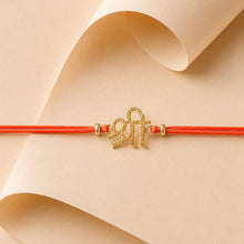 Load image into Gallery viewer, Gold Shri Rakhi with Orange Cord for Brother