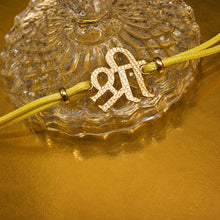 Load image into Gallery viewer, Gold Shri Rakhi with Yellow Cord