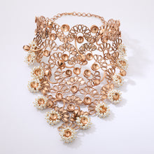 Load image into Gallery viewer, Gold toned drape choker necklace with crests worn by Namrata Shirodkar
