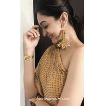 Load image into Gallery viewer, gold-rose-vine-cuff-with-green-crystals-worn-by-priyamani