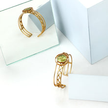 Load image into Gallery viewer, GOLD TONED TRIPLE LINED DOTTED CUFF WITH CHARTREUSE ACRYLIC CIRCLE