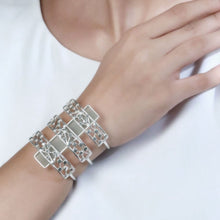 Load image into Gallery viewer, SILVER TONED TRIPLE LINED DOTTED CUFF OVERLAID ON CYAN ACRYLIC BLOCK