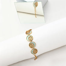 Load image into Gallery viewer, GOLD TONED CYAN ACRYLIC TANGENT CHOKER WITH INLAID DOTTED CIRCLES
