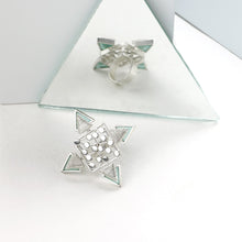 Load image into Gallery viewer, SILVER TONED DOTTED RHOMBUS RING WITH COILED CYAN ACRYLIC TRIANGLES WORN BY MALAVIKA NAIR