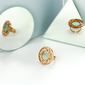 GOLD TONED ROUND RING WITH CYAN ACRYLIC & DOTTED CIRCLE