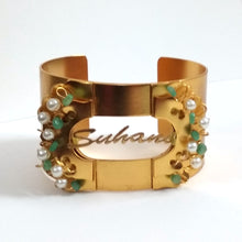 Load image into Gallery viewer, Green stone and pearl gold hand cuff
