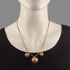 Hemera gold plated orb neckpiece