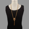 Aura gold long neckpiece with tassle