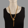 Electra gold plated long neckpiece with tassle