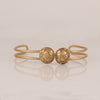 Abani gold plated wire hand cuff