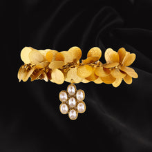 Load image into Gallery viewer, Gold coin cluster cuff with crystal flower charm
