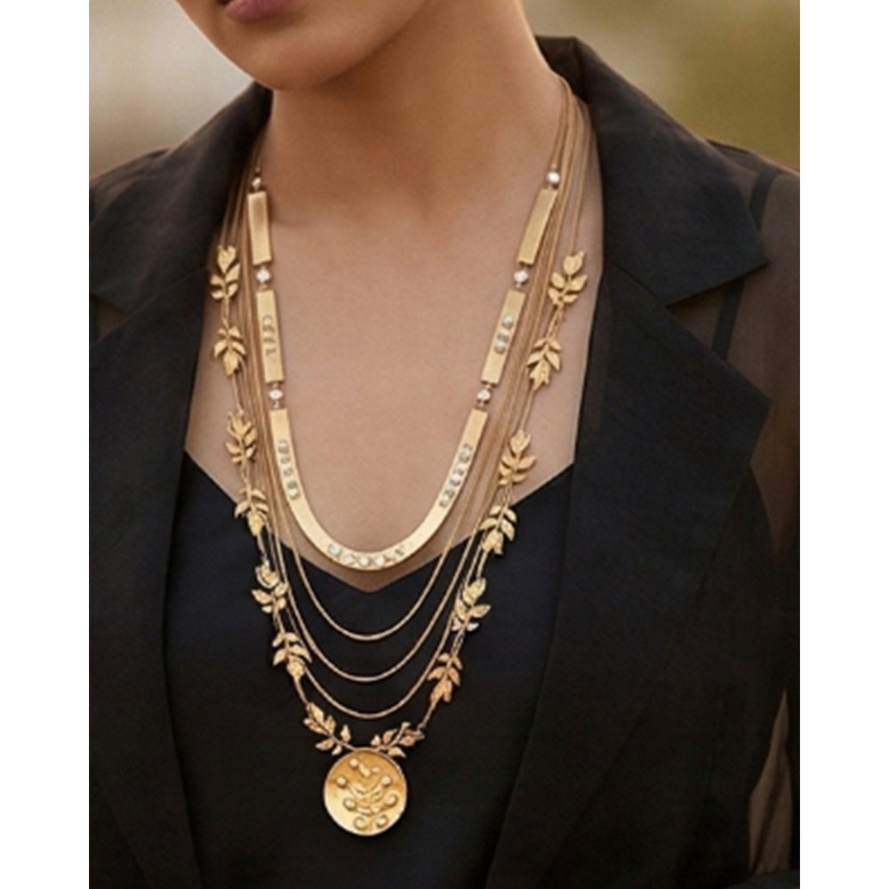Gold toned layered necklace with serrate and chain-link detailing