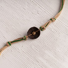 Load image into Gallery viewer, Unique Betel Nut Rakhi with Green &amp; Jute Threads
