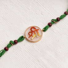 Load image into Gallery viewer, Shree Rakhi Handpainted on an Acryclic Disc
