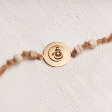 Load image into Gallery viewer, Laser Shree Rakhi with Scroll &amp; Tulsi Beads Charm
