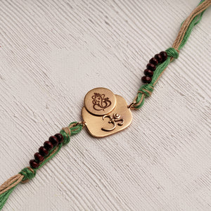 Om & Laser Ganeshji Rakhi with Chandan Beads