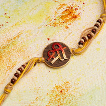 Load image into Gallery viewer, Handpainted Shree Rakhi with Tulsi &amp; Chandan Beads on jute thread
