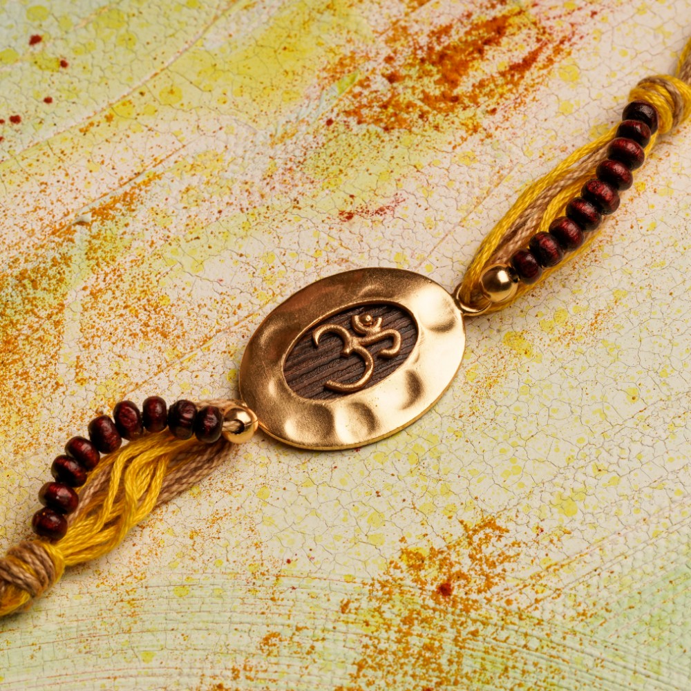 Om Rakhi Charm with Spiritual Chandan Beads