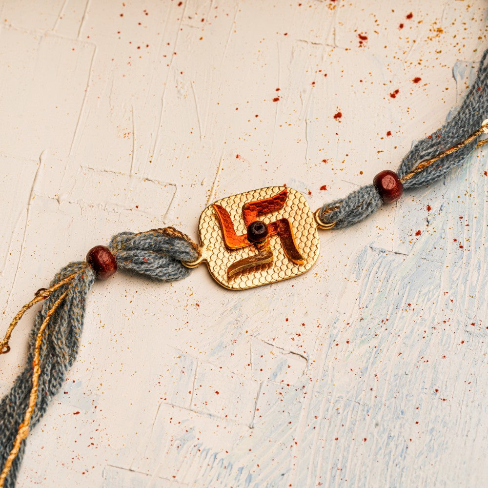 Handpainted Swastika Rakhi with Chandan Beads