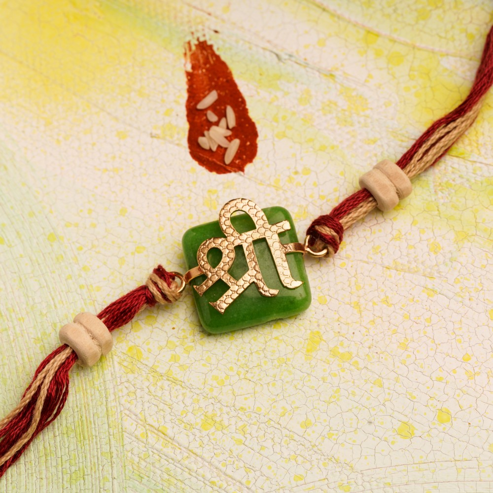 Shree Atop Green Chalcedony Rakhi for that August Sibling