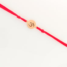 Load image into Gallery viewer, Gold Plated Om Rakhi with red thread
