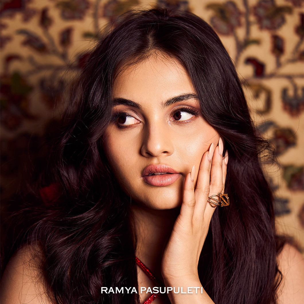 GOLD PLATED TWISTED WIRE RING WITH HEXGON AND DOUBLE ARROWS HANGING worn by Ramya Pasupuleti