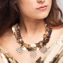 Load image into Gallery viewer, Gold coin twist neckpiece with floral crystal pendants
