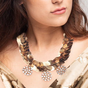 Gold coin twist neckpiece with floral crystal pendants