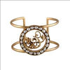 GOLD PLATED WIRE CUFF WITH ROUND CURLED AND PEARLS ON CENTER