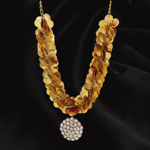 Gold coin cluster neckpiece with crystal pendant