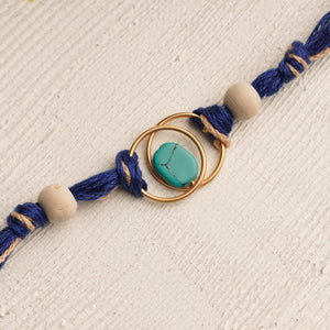 Turquoise Stone Rakhi with Tulsi Beads and Blue Thread