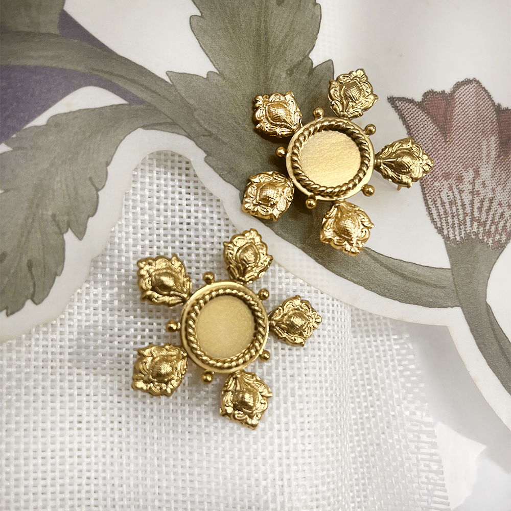 Aabha Gold plated Indian motif earrings