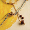 Set of Metal Ball Rakhi with Betel Nut Lumba