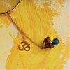 OM Lumba with Blue Onyx Charm & Auspicious Betel Nut