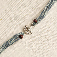 Load image into Gallery viewer, 92.5 Silver Rakhi with Denim Thread and Chandan Beads
