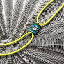 Load image into Gallery viewer, Silver Motif Neon Cord Rakhi bracelet
