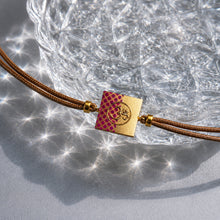 Load image into Gallery viewer, Handcrafted and painted 22K gold plated Cord Rakhi for Brother
