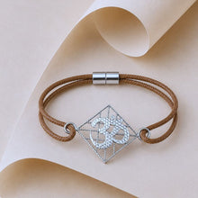 Load image into Gallery viewer, Silver Om Rakhi with Reusable magnetic closure
