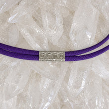 Load image into Gallery viewer, Minimalist stamped motif rakhi in silver with purple cord
