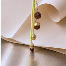 Load image into Gallery viewer, Neon Rudraksha Lumba Rakhi with Tulsi beads
