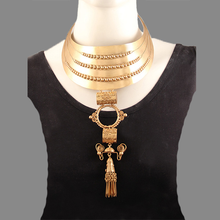 Load image into Gallery viewer, Gold Toned Tribal Statement Neckpiece worn by Sonakshi Sinha
